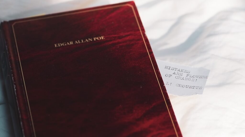 red book on white textile