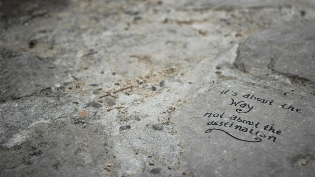 a close up of a rock with writing on it