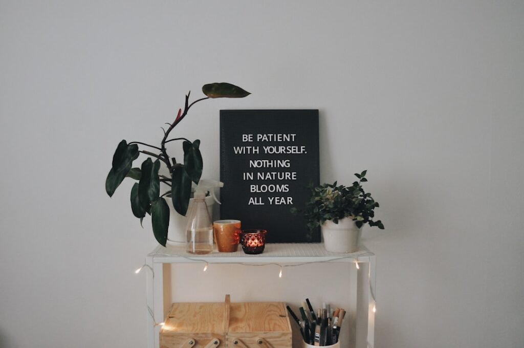 a shelf with a plant and a sign on it