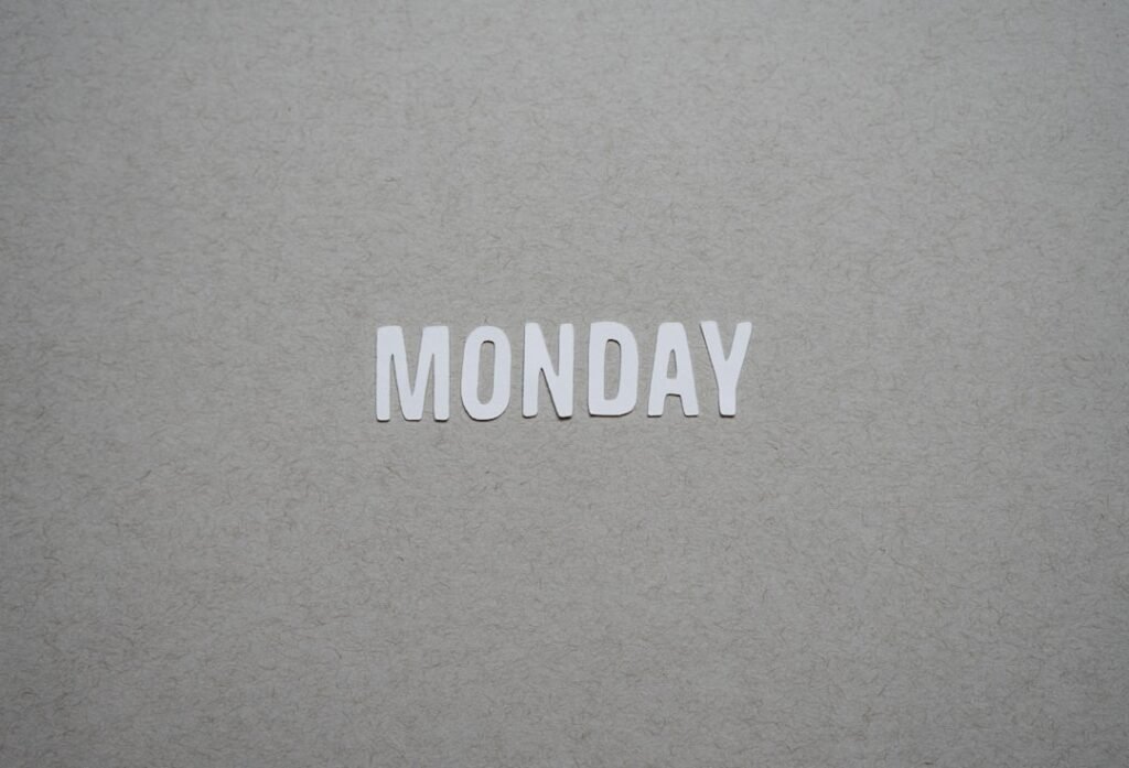 the word monday is cut out of white paper